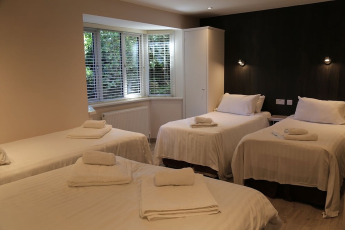 Imagen de la habitación del Hotel Debden Guest House. Foto 16
