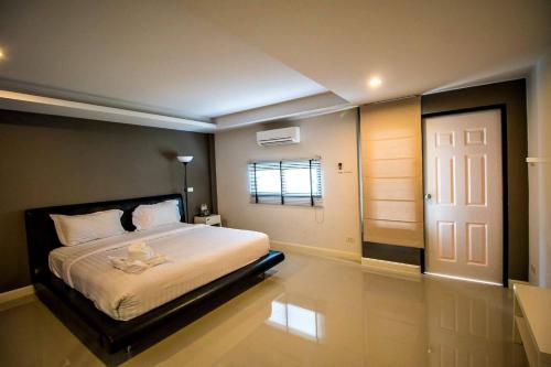 Imagen de la habitación del Hotel Debua Mahasarakham. Foto 7