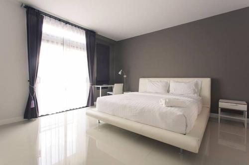 Imagen de la habitación del Hotel Debua Mahasarakham. Foto 8