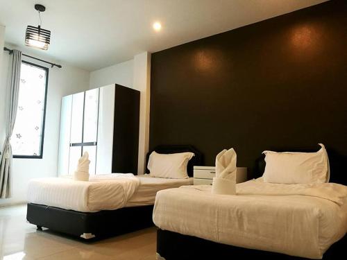 Imagen de la habitación del Hotel Debua Mahasarakham. Foto 9
