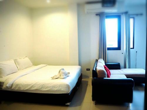 Imagen de la habitación del Hotel Debua Mahasarakham. Foto 10