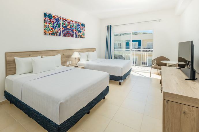 Imagen de la habitación del Hotel Decameron La Marina Guayabitos, Ramada All-Inclusive Resort. Foto 8