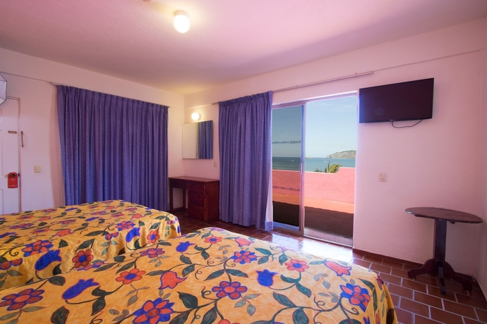 Imagen de la habitación del Hotel Decameron Los Cocos Guayabitos, Ramada All-Inclusive Resort. Foto 5