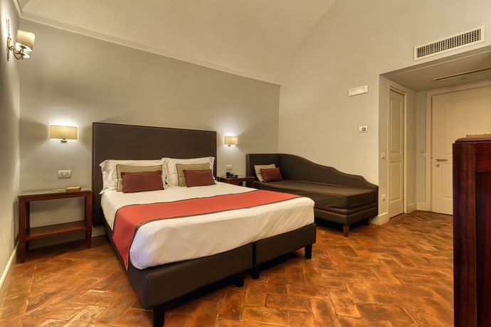 Imagen de la habitación del Hotel Decumani De Charme. Foto 2