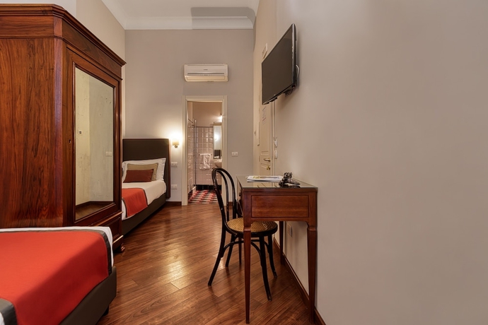 Imagen de la habitación del Hotel Decumani De Charme. Foto 9