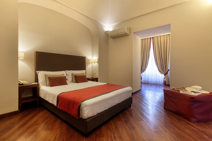 Imagen de la habitación del Hotel Decumani De Charme. Foto 10