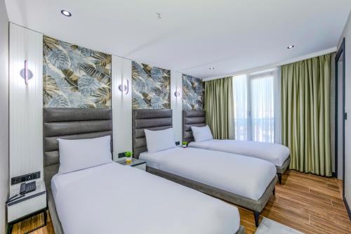 Imagen de la habitación del Hotel Dedem Premium - &Ccedil;orlu. Foto 16