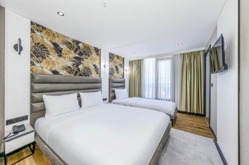 Imagen de la habitación del Hotel Dedem Premium - &Ccedil;orlu. Foto 17