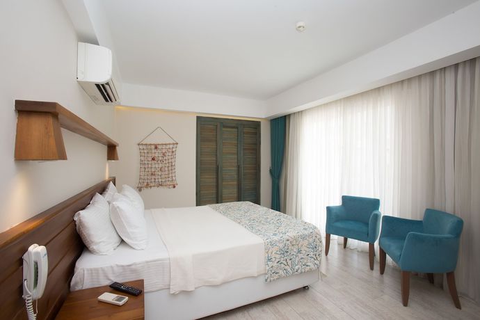 Imagen de la habitación del Hotel Dedeminn Marina. Foto 11