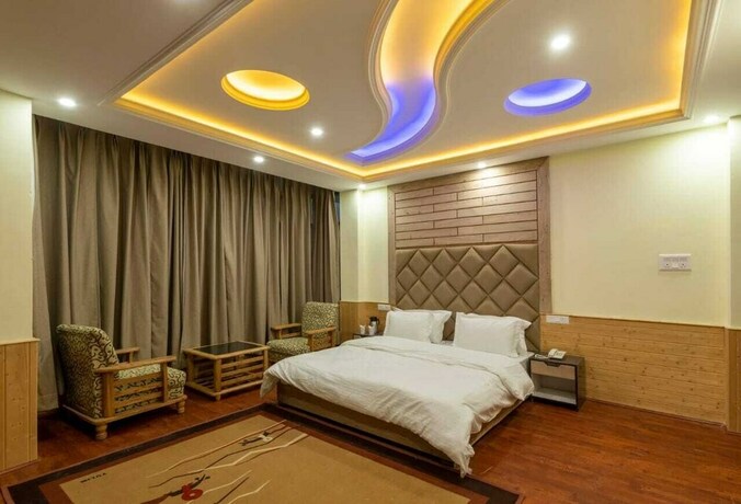 Imagen de la habitación del Hotel Dee Grand Marq. Foto 18