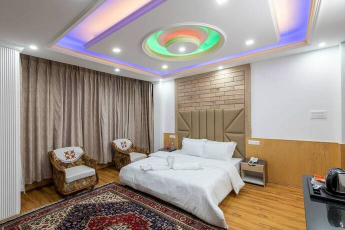 Imagen de la habitación del Hotel Dee Grand Marq. Foto 21