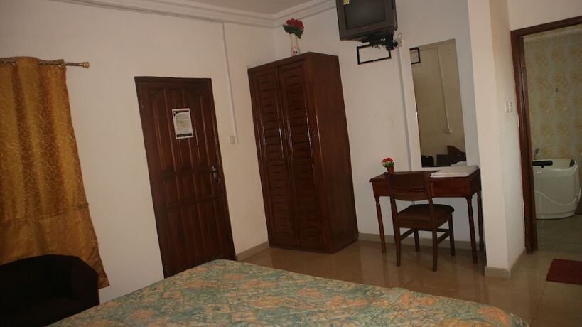Imagen de la habitación del Hotel DeeGold Guest Home. Foto 16