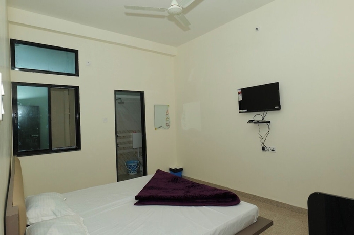 Imagen de la habitación del Hotel Deeksha. Foto 1