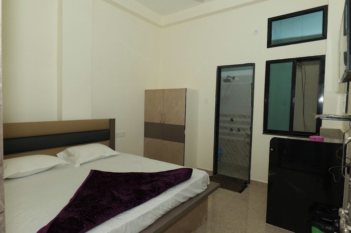 Imagen de la habitación del Hotel Deeksha. Foto 8