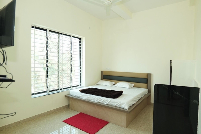 Imagen de la habitación del Hotel Deeksha. Foto 9