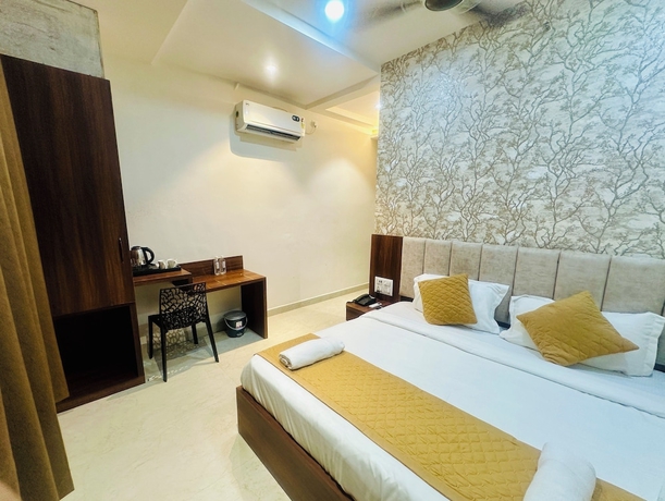 Imagen de la habitación del Hotel Deep Palace, Varanasi. Foto 1