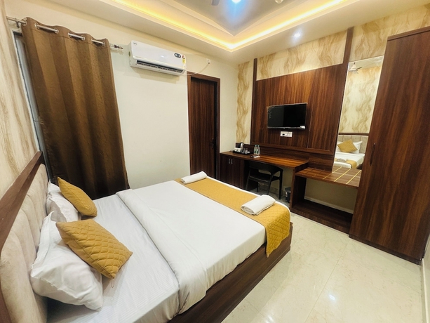 Imagen de la habitación del Hotel Deep Palace, Varanasi. Foto 3