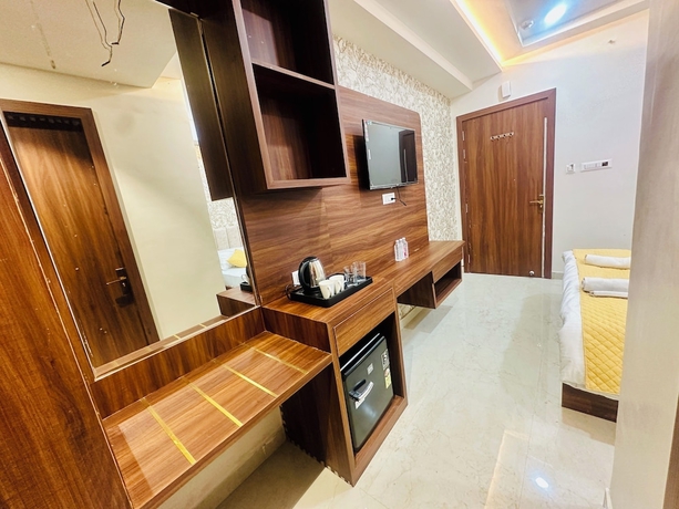 Imagen de la habitación del Hotel Deep Palace, Varanasi. Foto 6