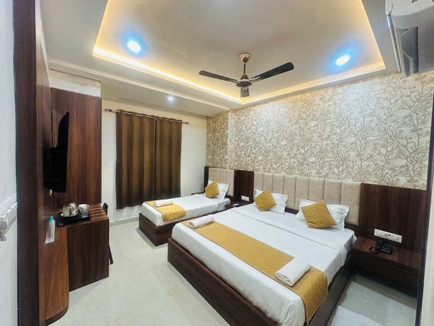 Imagen de la habitación del Hotel Deep Palace, Varanasi. Foto 7