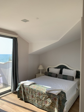 Imagen de la habitación del Hotel Defne Beach. Foto 5