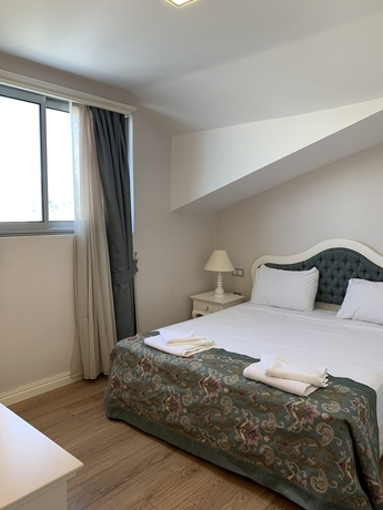 Imagen de la habitación del Hotel Defne Beach. Foto 7
