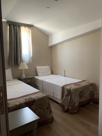 Imagen de la habitación del Hotel Defne Beach. Foto 12