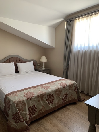 Imagen de la habitación del Hotel Defne Beach. Foto 13