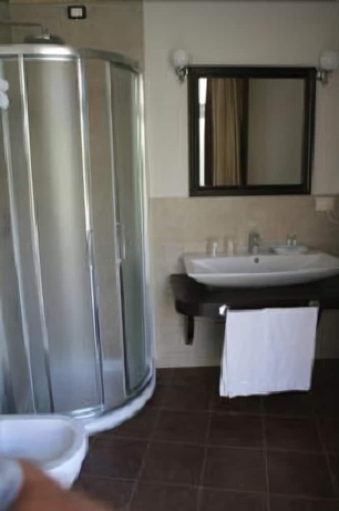 Imagen de la habitación del Hotel Dei Coloniali. Foto 17