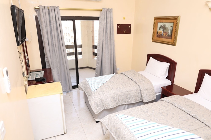 Imagen de la habitación del Hotel Deira Palace. Foto 2