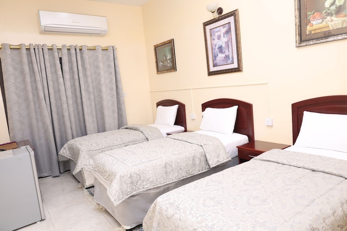 Imagen de la habitación del Hotel Deira Palace. Foto 4