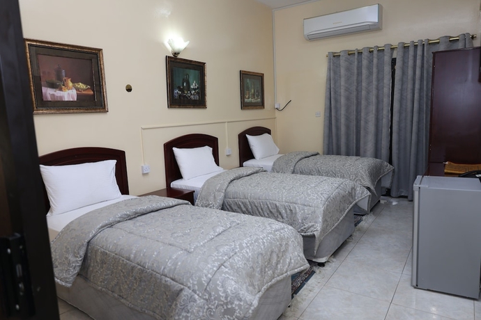Imagen de la habitación del Hotel Deira Palace. Foto 5