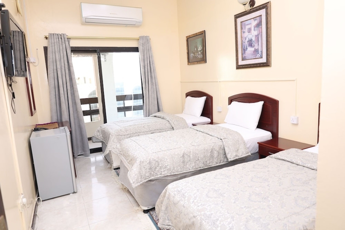 Imagen de la habitación del Hotel Deira Palace. Foto 8