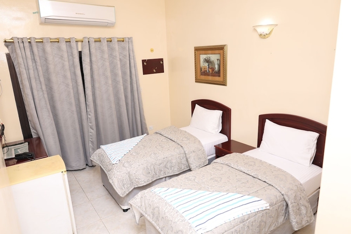 Imagen de la habitación del Hotel Deira Palace. Foto 11