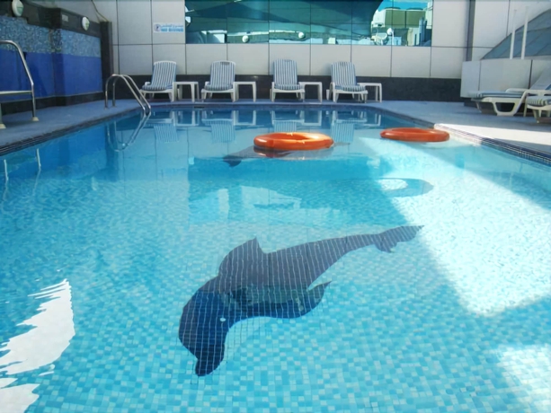 Imagen de la piscina del Hotel Deira Suites Apartment. Foto 19