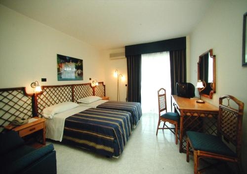 Imagen de la habitación del Hotel Del Faro - Pugnochiuso Resort. Foto 7