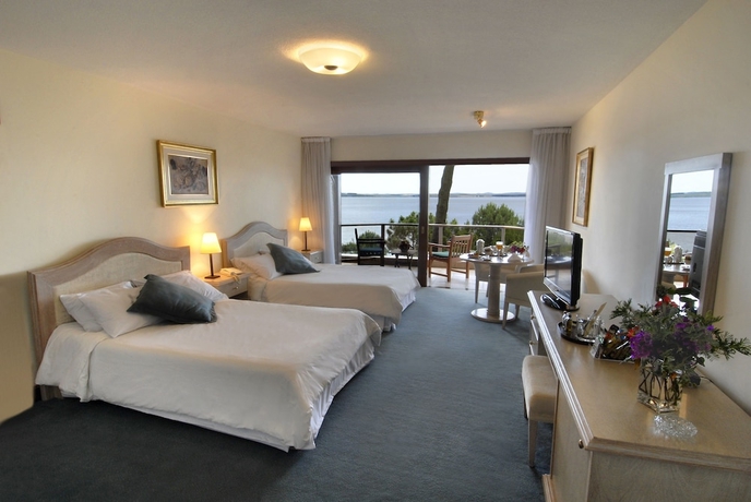 Imagen de la habitación del Hotel Del Lago Golf and Art Resort. Foto 8