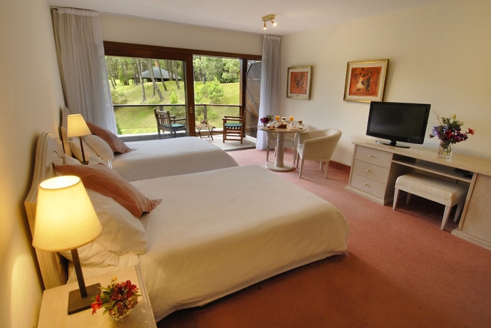 Imagen de la habitación del Hotel Del Lago Golf and Art Resort. Foto 9