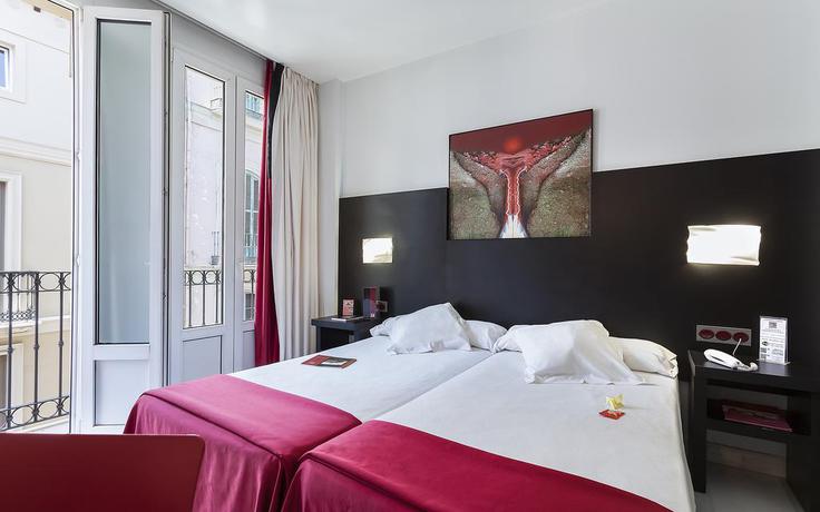 Imagen de la habitación del Hotel Del Pintor. Foto 5