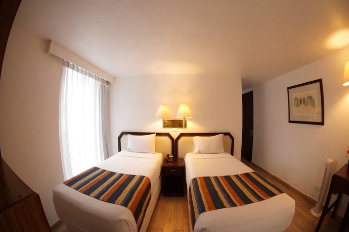 Imagen de la habitación del Hotel Del Portal. Foto 10