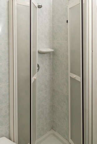 Imagen de la habitación del Hotel Del Postiglione. Foto 4