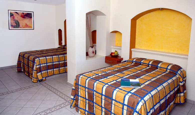 Imagen de la habitación del Hotel Del Real and Suites. Foto 9