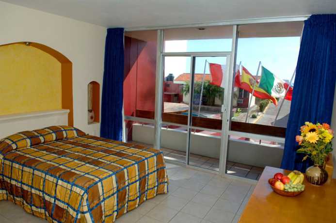 Imagen de la habitación del Hotel Del Real and Suites. Foto 10