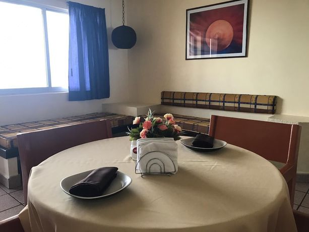 Imagen de la habitación del Hotel Del Real and Suites. Foto 11