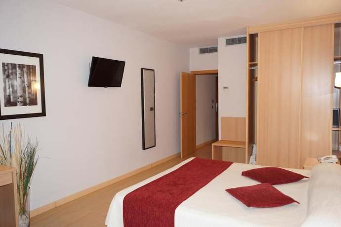 Imagen de la habitación del Hotel Del Vino. Foto 14