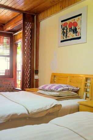 Imagen de la habitación del Hotel Delamu Inn. Foto 19
