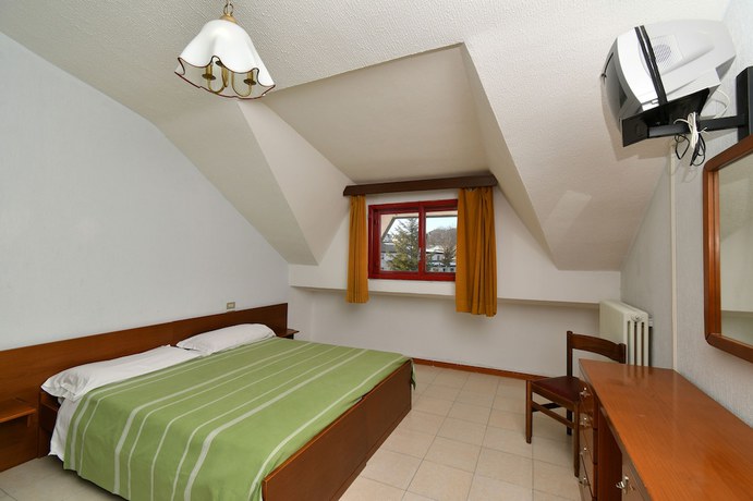 Imagen de la habitación del Hotel Delberg Palace. Foto 4