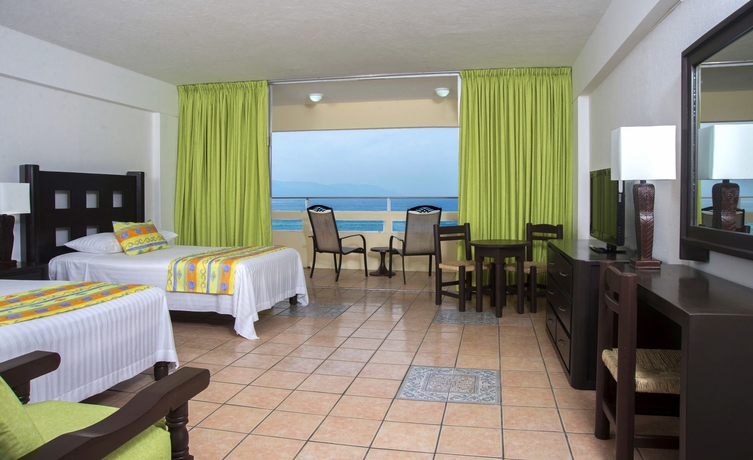 Imagen de la habitación del Hotel Delfin PV Beach Resort. Foto 8