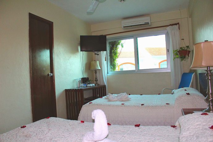 Imagen de la habitación del Hotel Delfin, Playa del Carmen. Foto 11