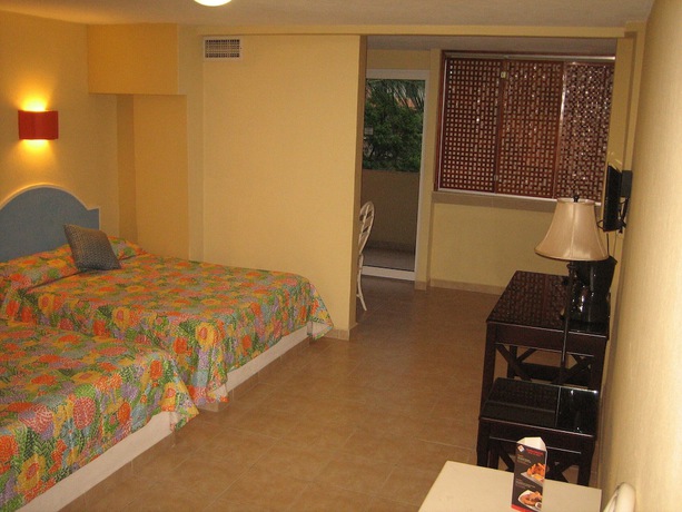 Imagen de la habitación del Hotel Delfines Acapulco By Nges. Foto 8