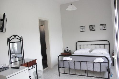 Imagen de la habitación del Hotel Delfini, Ad&aacute;mas. Foto 7